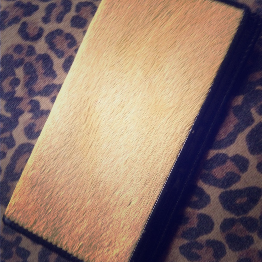 Yellow mohair checkbook cover.
